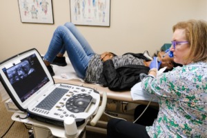 Dr. Lisa Barr performs ultrasound-guided neural therapy on scar tissue to relieve neck pain.