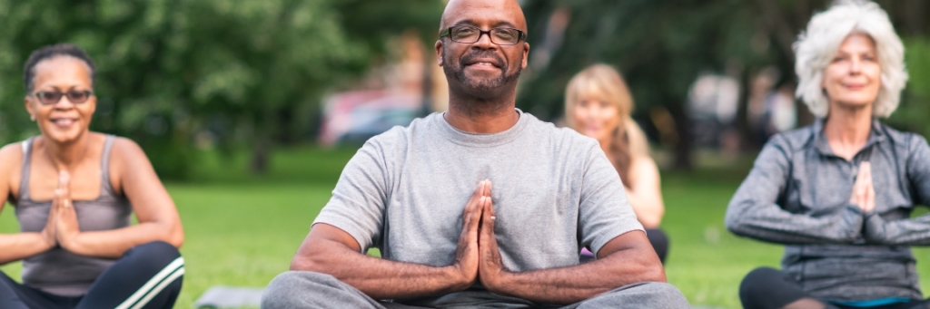 Glimpse of outdoor group meditation to help reduce stress